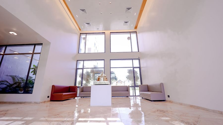 An image of a huge reception lobby featuring sofa and centre table at Pride Resort Ambaji